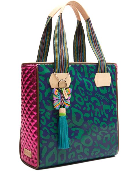 Stylishly Chic: Consuela's Trending Snake Print Bag